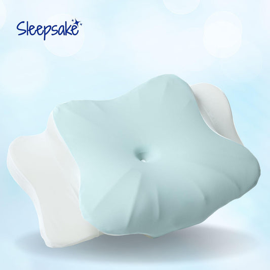 Baby head support pillow with 'Sleepsake' branding on a light blue background